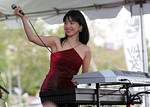 Keiko Matsui at the Monterey Park Cherry Blossom Festival '06 : "Keiko Matsui is a Japanese smooth jazz/new age pianist and composer whose music and sophisticated elegance have propelled her to success. A prolific recording artist, Matsui's career spans three decades, during which time she has released twenty CDs and has received international acclaim." - Wikipedia